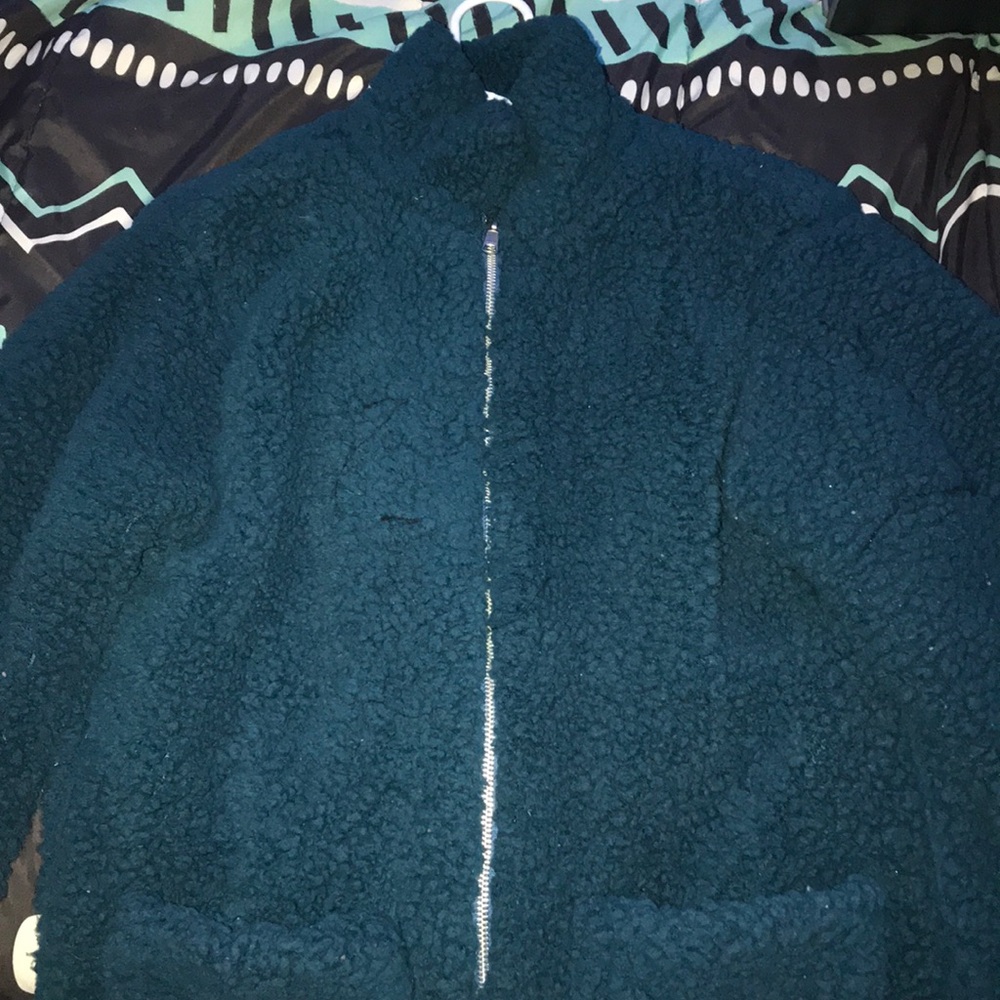 I’m selling a teal colored jacket.